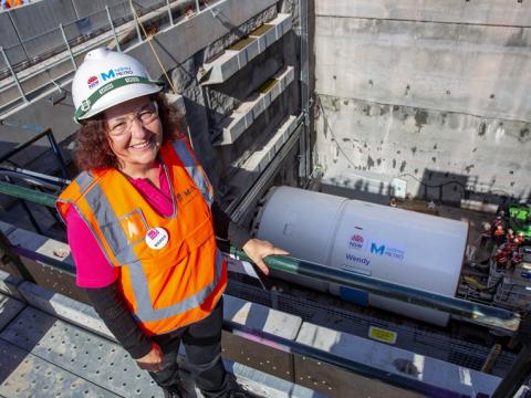 An arial shot looking down at Wendy Schreiber, a volunteer at Bear Cottage after whom our mega tunnel boring machine Wendy is named after below you can see Tunnel Boring Machine Wendy as it begins work at Chatswood Drive. 