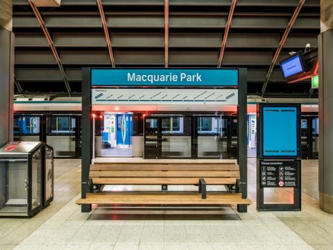 An artist's impression from the platform looking at the platform benches at Sydney Metro's Macquarie Park Station.