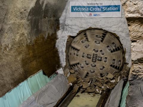 The cutterhead on tunnel boring machine Wendy can be seen breaking through the wall at Victoria Cross Station