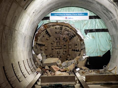 The cutterhead of tunnel boring machine Nancy can be seen breaking through the wall at Martin Place Station. 