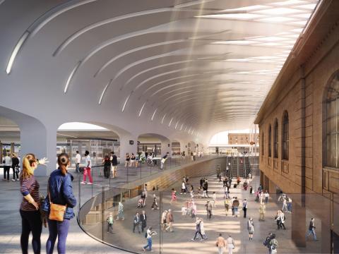 Artist's impression of commuters walking around the new Central upgrade at Eddy Avenue. Some people are on a raised level looking down at commuters below.