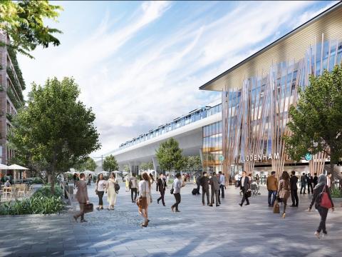 An artist impression of people walking around in front of the new Luddenham Station being delivered as part of the Sydney Metro – Western Sydney Airport project.