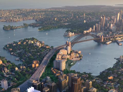 A bird's eye view overlooking Sydney Harbour showing the icons Lunar Park, Sydney Harbour Bridge, Sydney Opera House, Sydney CBD skyline with Centrepoint Tower and surrounding suburbs.