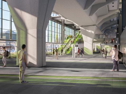 Artist's impression of people walking inside the concourse of Sydney Metro's Rouse Hill Station.
