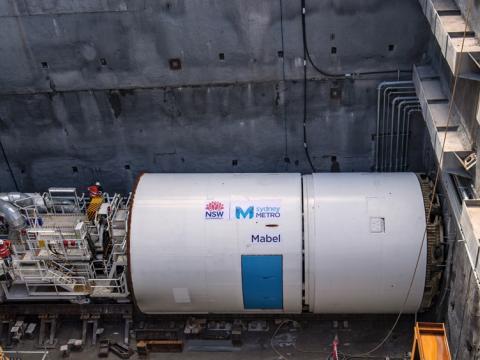 An arial view looking down at Tunnel Boring Machine Mabel in place at a Sydney Metro construction site.