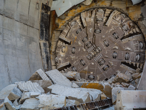 An on the ground view showing Tunnel Boring Machine (TBM) 3 Isabelle breaking through the stone at Sydney Metro's Epping Station. 