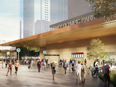 An artist's impression of commuters walking around outside the new Sydney Olympic Park metro station.