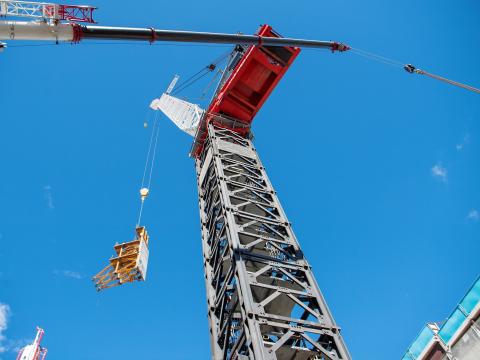 Metal structure being lifted by a crane at Sydney Metro's Crows Nest Station. 