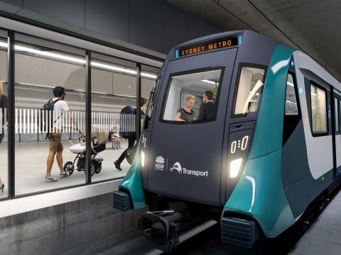 Artist's impression of a Sydney Metro train travelling in underground tunnel and arriving at Pyrmont Station