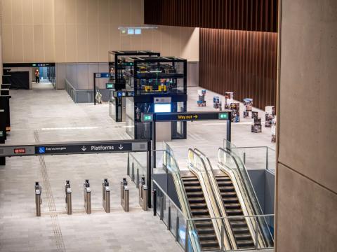 Platforms at Waterloo Station depicting escalators and lifts