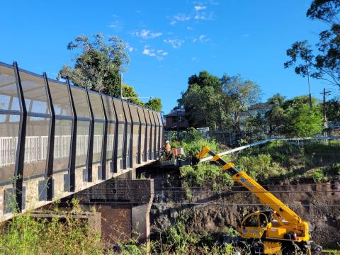 Work is going on with a crane on the T3 Bankstown line