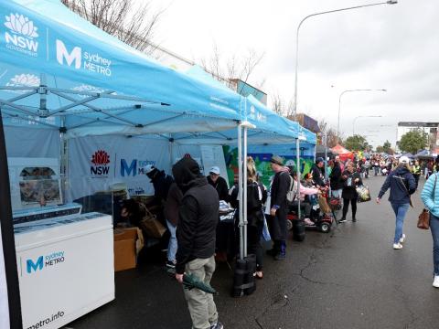 Blue marquees are lined up for a Sydney Metro event