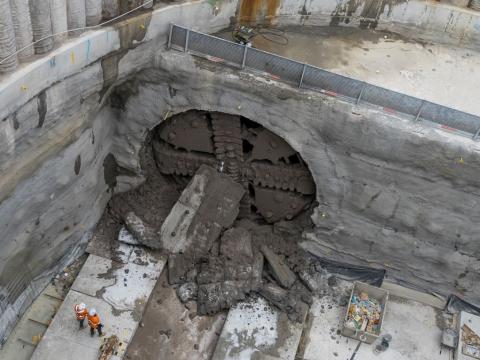 TBM breaking through with two spectators 