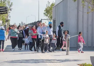 A group of community members gathered outside of Sydney Metro's Tallawong Station as part of the community day event.