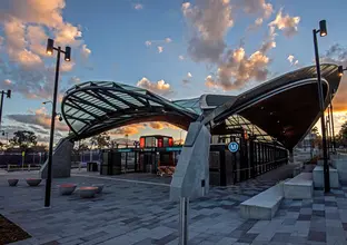 Ground level view of the entrance at Sydney Metro's Hills Showground Station.