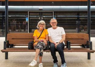 Couple sitting at the platform