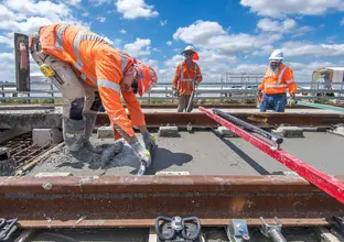 Workers are laying the First tracks for new Western Sydney Airport metro  