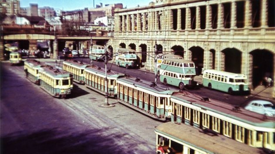 A photograph from 1954 showing a bird's eye view of old trams and busses outside of Central Station on Eddy Avenue (image from City of Sydney Archives:044520)