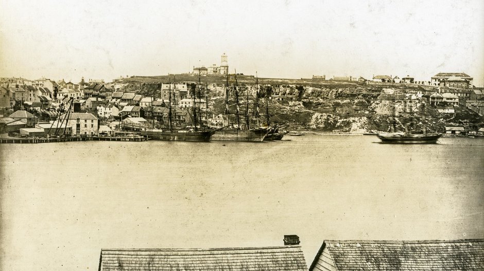 Black and white photo of a rooftop view of Millers Point as seen from McMahons Point in 1870.