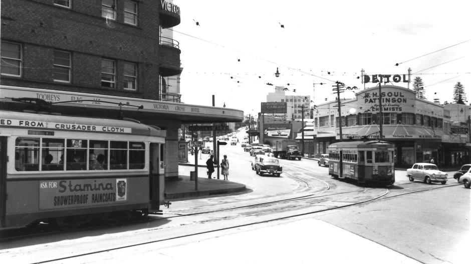 Trams and cars travelling on the Pacific Highway, North Sydney