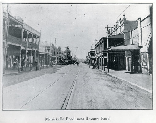 Black and white photo of shops on Marrickville Road near Illawarra Road.