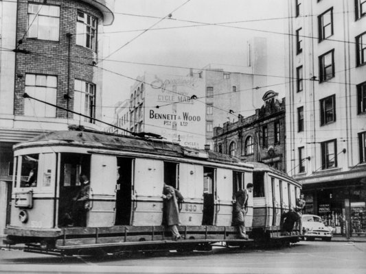 Customers travelling by tram, corner of Park and Pitt streets