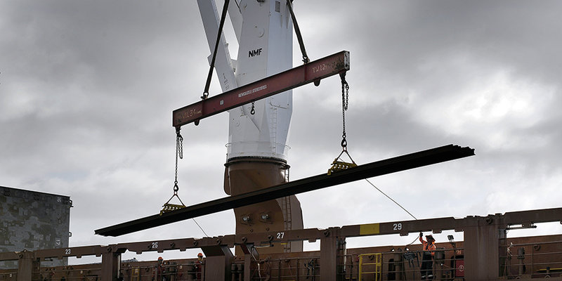 photo of steel beams being craned