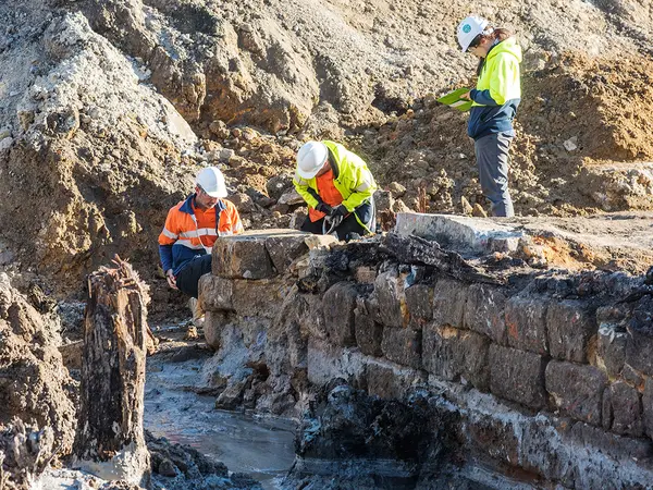 3 construction workers on site during an excavation at the Barangoo Heritage site.