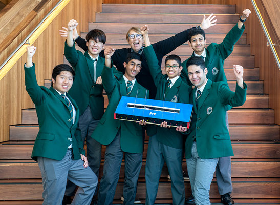 The team from Cumberland High School after their win in the final of Metro Minds Steam Challenge held at the ICC in Sydney.