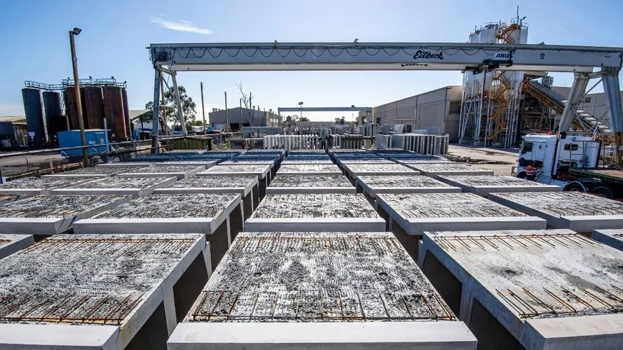 Rows of precast concrete segments are lined up sitting at the western precast facility.