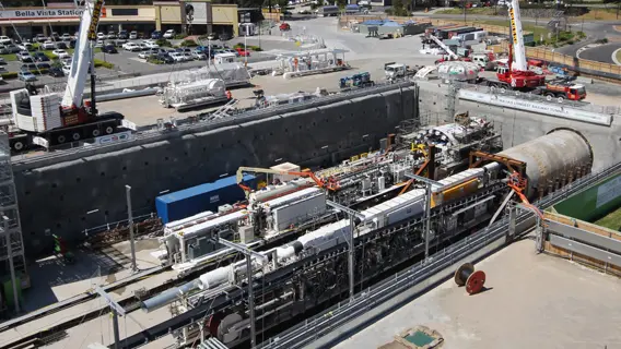 An arial view looking down at Tunnel Boring Machine (TBM) 2 Florence being assembled at the construction site at Sydney Metro's Bella Vista Station.