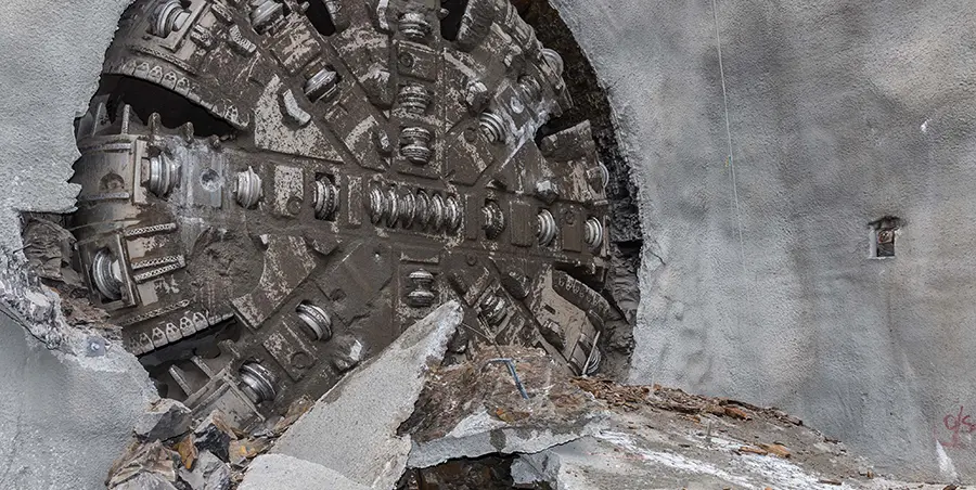An on the ground view showing Tunnel Boring Machine (TBM) 3 Florence final break through the stone at Sydney Metro's Cherrybrook Station.