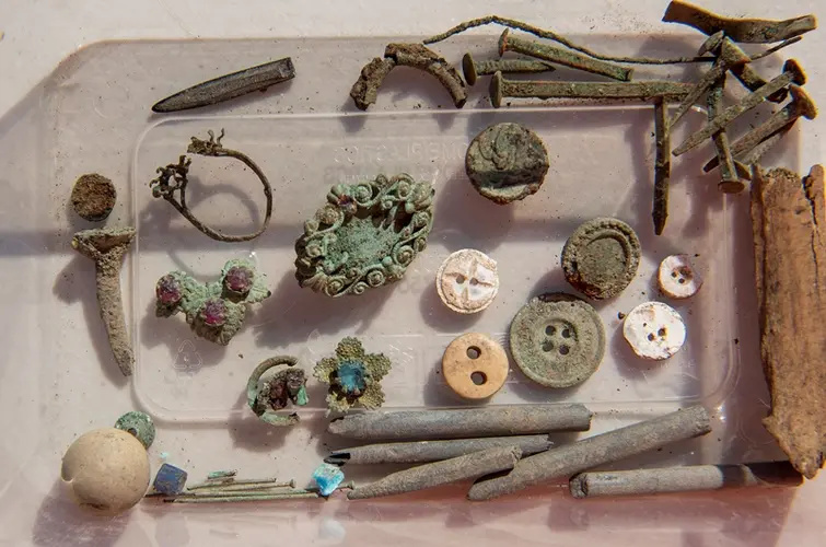A close up of some of the old artefacts that were found at Blues Point construction site. Buttons, nails and screws are amongst the items found.