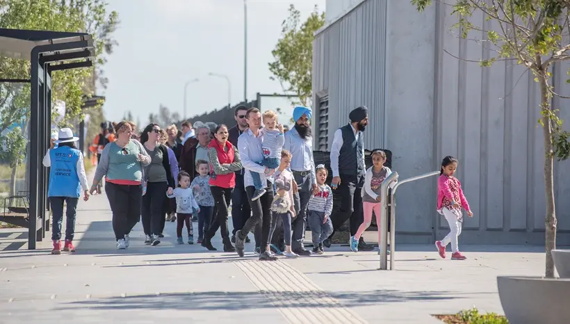 A group of community members gathered outside of Sydney Metro's Tallawong Station as part of the community day event.