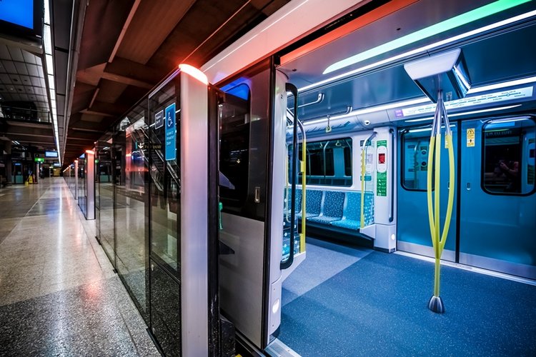An artist's impression showing a close up of the Sydney Metro train's interior as it has stopped at North Ride Station platform. 