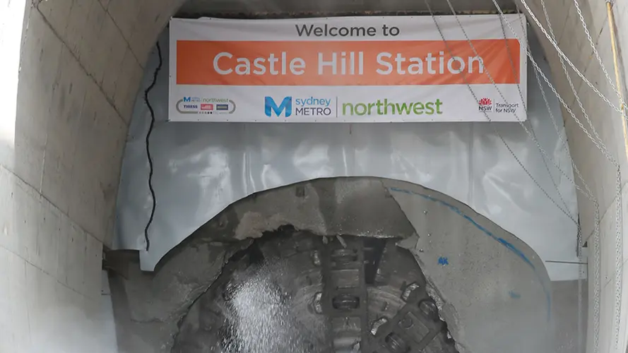 An on the ground view showing Tunnel Boring Machine (TBM) 2 Florence final break through the stone at Sydney Metro's Castle Hill Station.