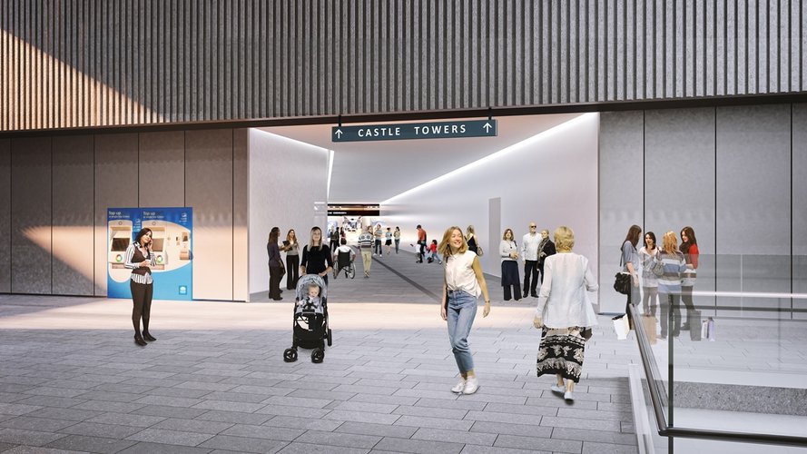 An Artist's impression of commuters walking through pedestrian link with signage displaying Castle Towers at Sydney Metro's Castle Hill Station. 