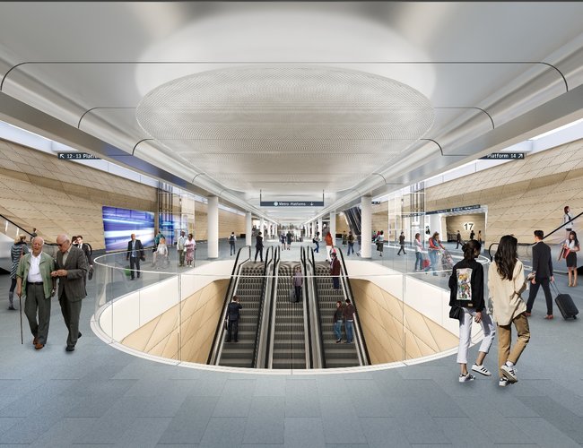 Artist's impression of commuters walking around inside the new Sydney Metro Central Station entrance at the top of the escalators.