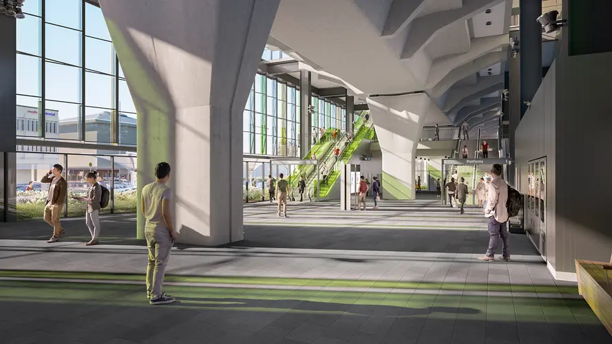 Artist's impression of people walking inside the concourse of Sydney Metro's Rouse Hill Station.
