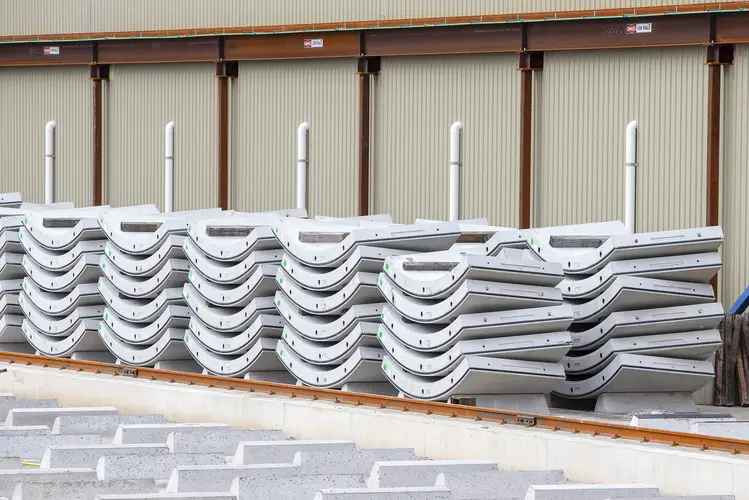 An on the ground shot showing rows on precast concrete segments lined up for production at Marrickville precast facility.