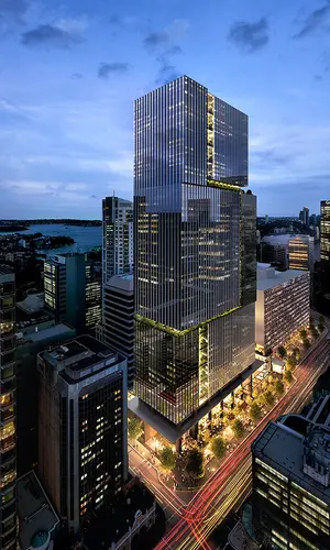 An artist's impression from above looking down at Sydney Metro's Victoria Cross Station over station development building at night.