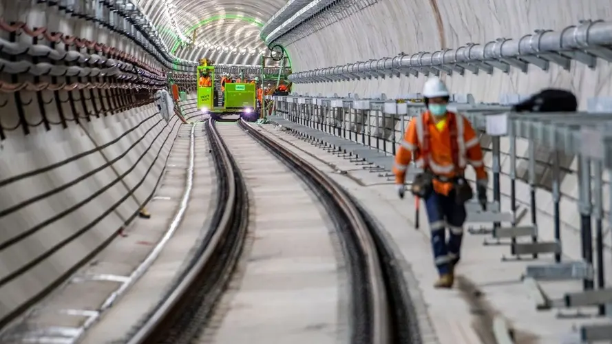 A safety walkway is installed inside the Sydney Metro tunnels just north of the Blues Point access shaft.