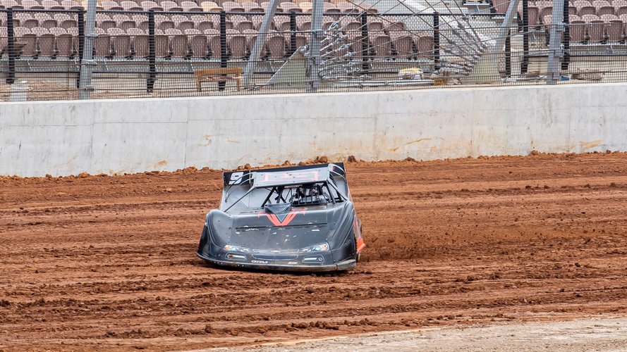 A race car drives in the dirt track at the new Eastern Creek Speedway.