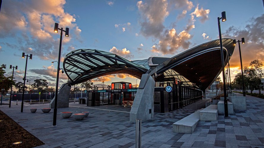 Ground level view of the entrance at Sydney Metro's Hills Showground Station.
