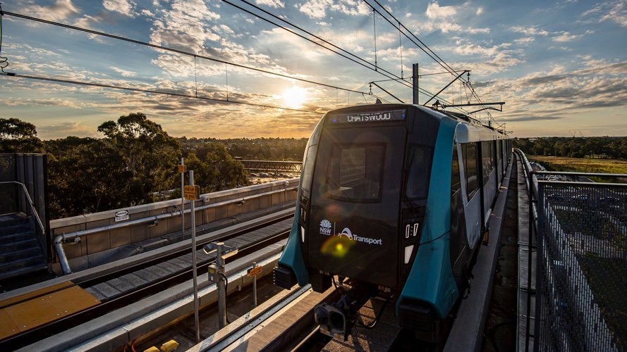 Sydney Metro train on the tracks arriving at Sydney Metro's Kellyville Station.
