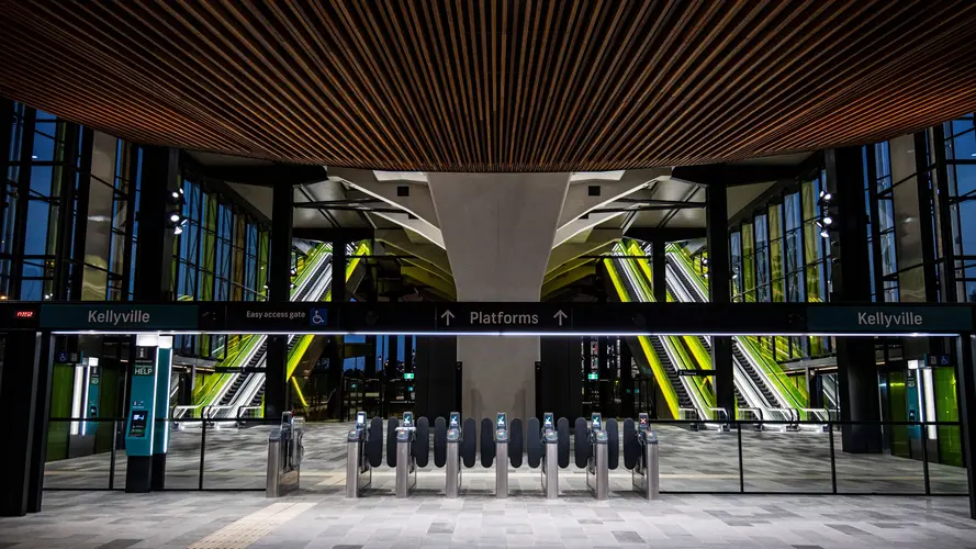 Ground level view of the entrance to the platforms at Sydney Metro's Kellyville Station.