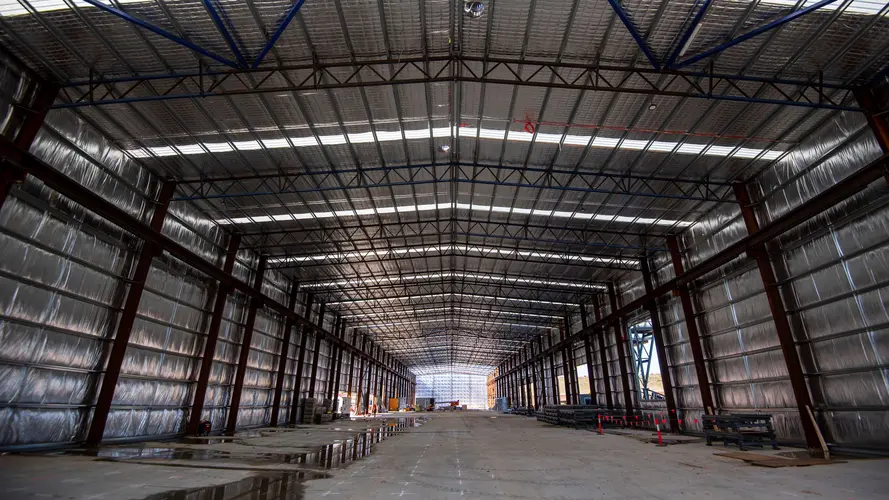 An on the ground view of construction shed at Sydney Metro's Eastern Creek Station precast site.
