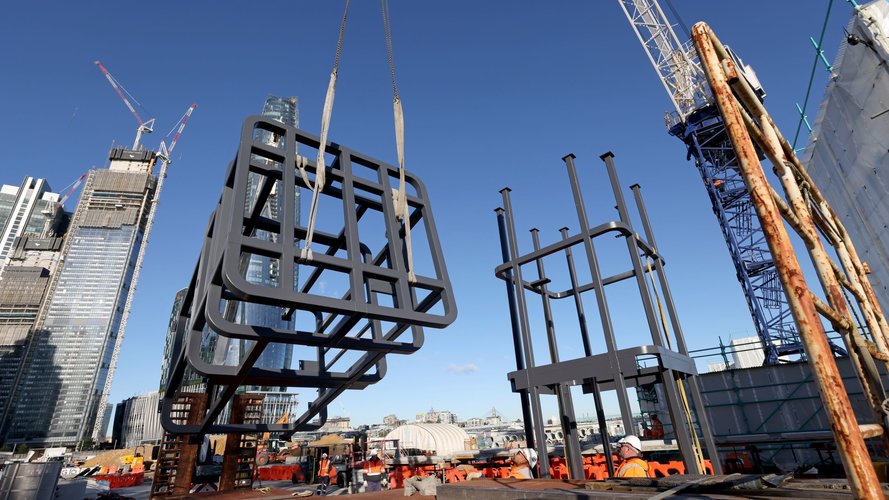 Steel structures are craned into position at Sydney Metro's new station, Barangaroo.