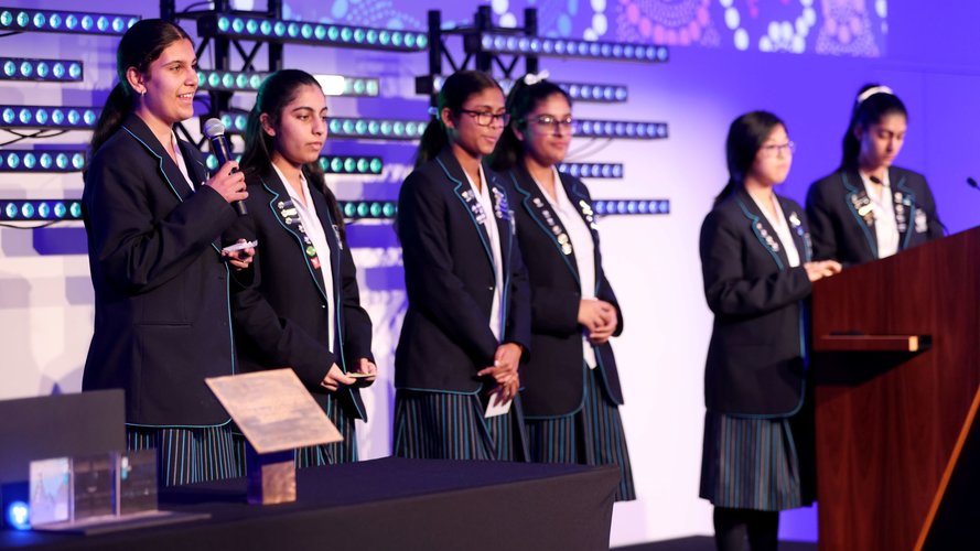 Students presenting to an audience