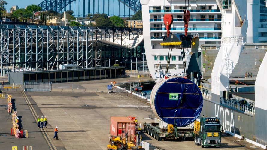 Cargo ship unloading front shield component of a tunnel boring machine (TBM) at White Bay, Sydney.